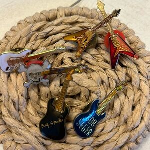 Set of 1980 enamel guitar pins
